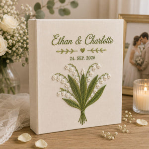 Personalized lily of the valley hand embroidered photo album with custom names and wedding date on linen cover