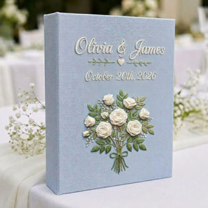 Personalized white rose bouquet hand embroidered photo album with custom names and wedding date on blue linen cover