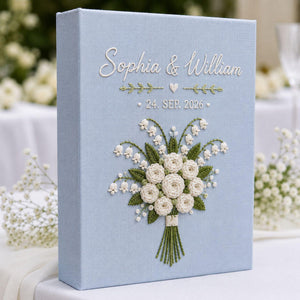 Personalized white rose bouquet hand embroidered photo album with custom names and wedding date on blue linen cover