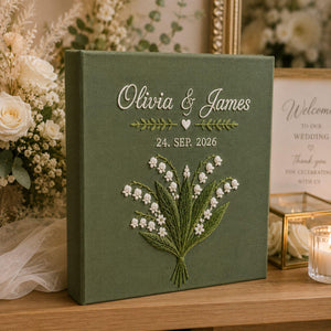 Personalized lily of the valley hand embroidered photo album with custom names and wedding date on linen cover