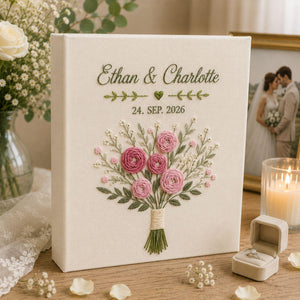 Personalized pink ranunculus bouquet hand embroidered photo album with custom names and wedding date on linen cover