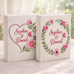 Personalized pink floral wreath hand embroidered photo album with butterfly accent and custom names on linen cover