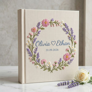 Personalized wildflower wreath hand embroidered photo album with custom names and wedding date on linen cover